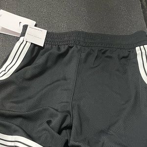 Nike fit shorts boys medium never worn.Color black and white.athletic shorts.